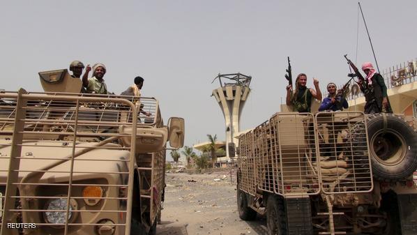 Southern Resistance fighters ride armoured personnel carriers at the international airport of Yemen's southern port city of Aden, July 14, 2015. Gulf-backed Yemeni forces recaptured Aden's international airport from Houthi militia fighters on Tuesday as heavy combat took place across the port city following the collapse of a humanitarian truce, the exiled government said. REUTERS/Stringer