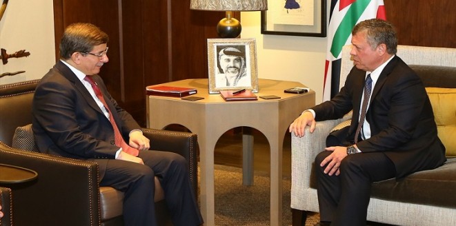 العاهل الأردني وأوغلو يؤكدان على رفع مستوى التعاون بين بلديهما