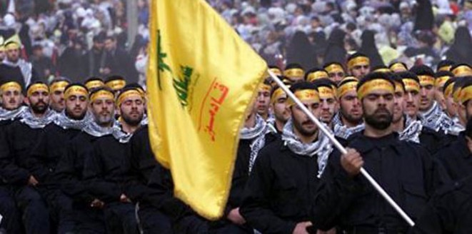 مقاتلو حزب الله  في سوريا يقاتلون كموظفين في شركة تجارية